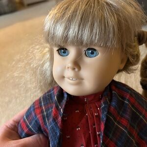 American Girl Doll with Blue Eyes and Plaid Outfit